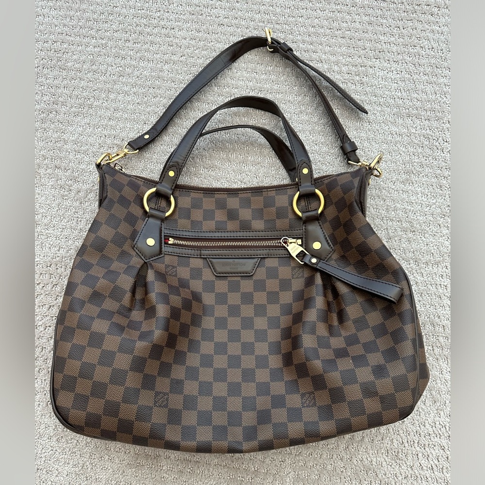 Pre-loved Louis Vuitton brown canvas medium model